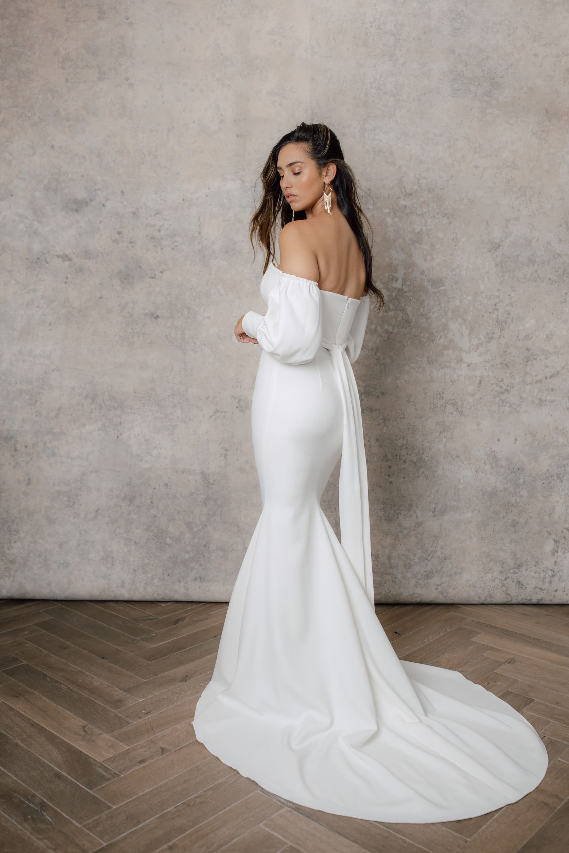 Wedding-Dresses-London-2023-Charlie-Brear-Seraphine-Bodice-Fishtail-Skirt-Jada-Sleeves-Back.jpg