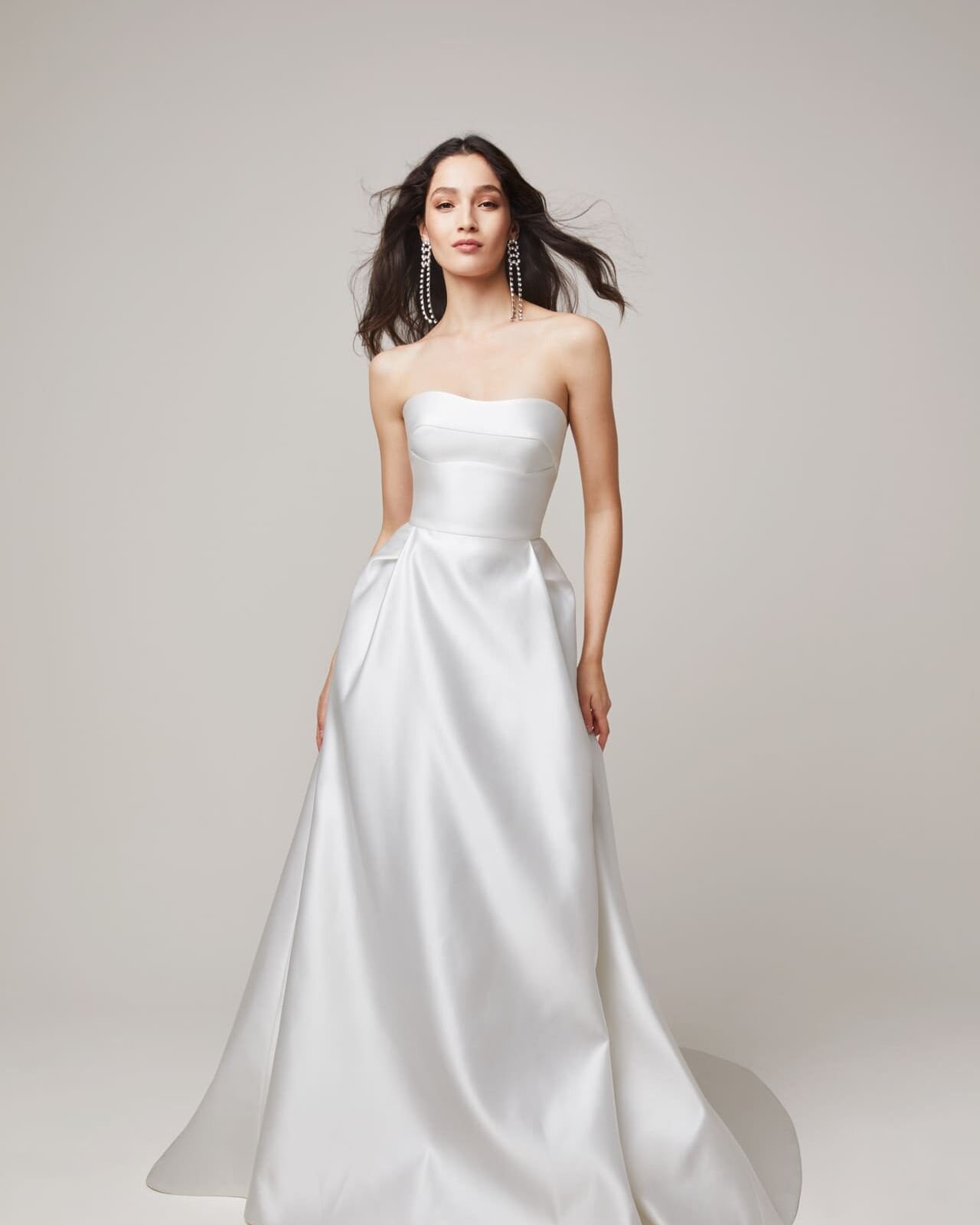 Feeling a little scared of strapless?! 

A strapless dress made well with the right structure will not have you constantly pulling it up through the big day. All too often brides are a little nervous about trying a strapless option - but give them a 