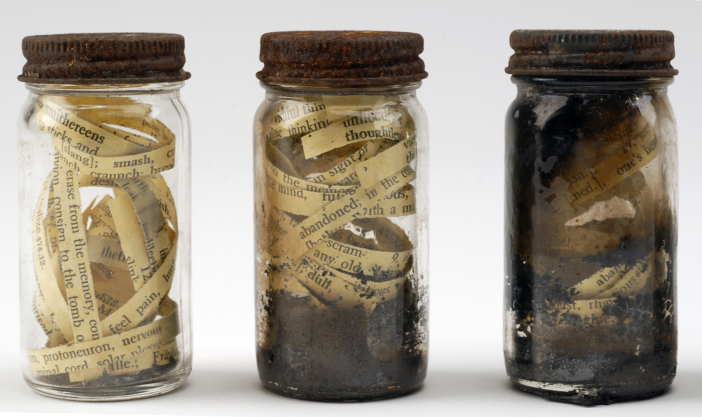 Anthony combs the ashes in search of his memory: Fourteen jars