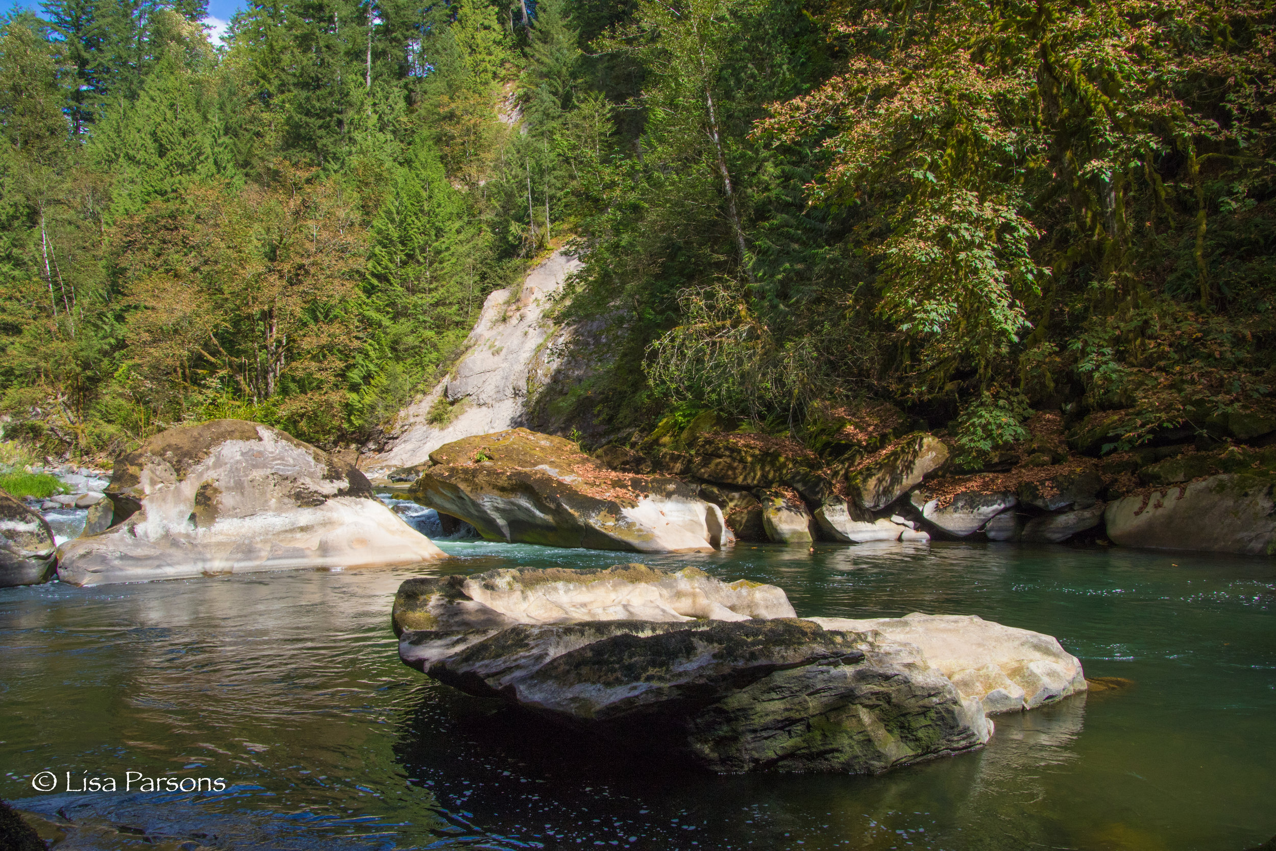 Here is the infamous NOZZLE rapid at low water. Rocks choke the flow of the river through narrow slots between large sandstone boulders. 