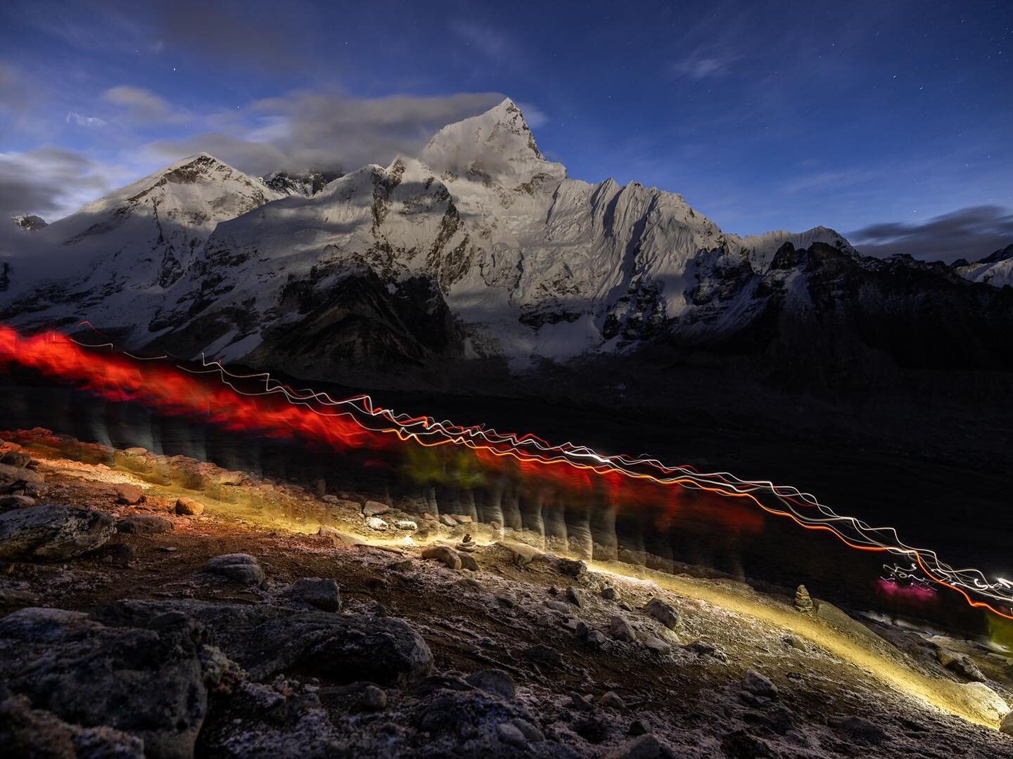 B&amp;W or colour? 

Hikers&rsquo; en route to the summit of Kala Patthar in the early hours were overshadowed by the sharp pinnacles of Nuptse (7,861m) in Khumbu region of the Nepalese Himalayas. October 2022. 

@frasermorton__ took this photo on a 