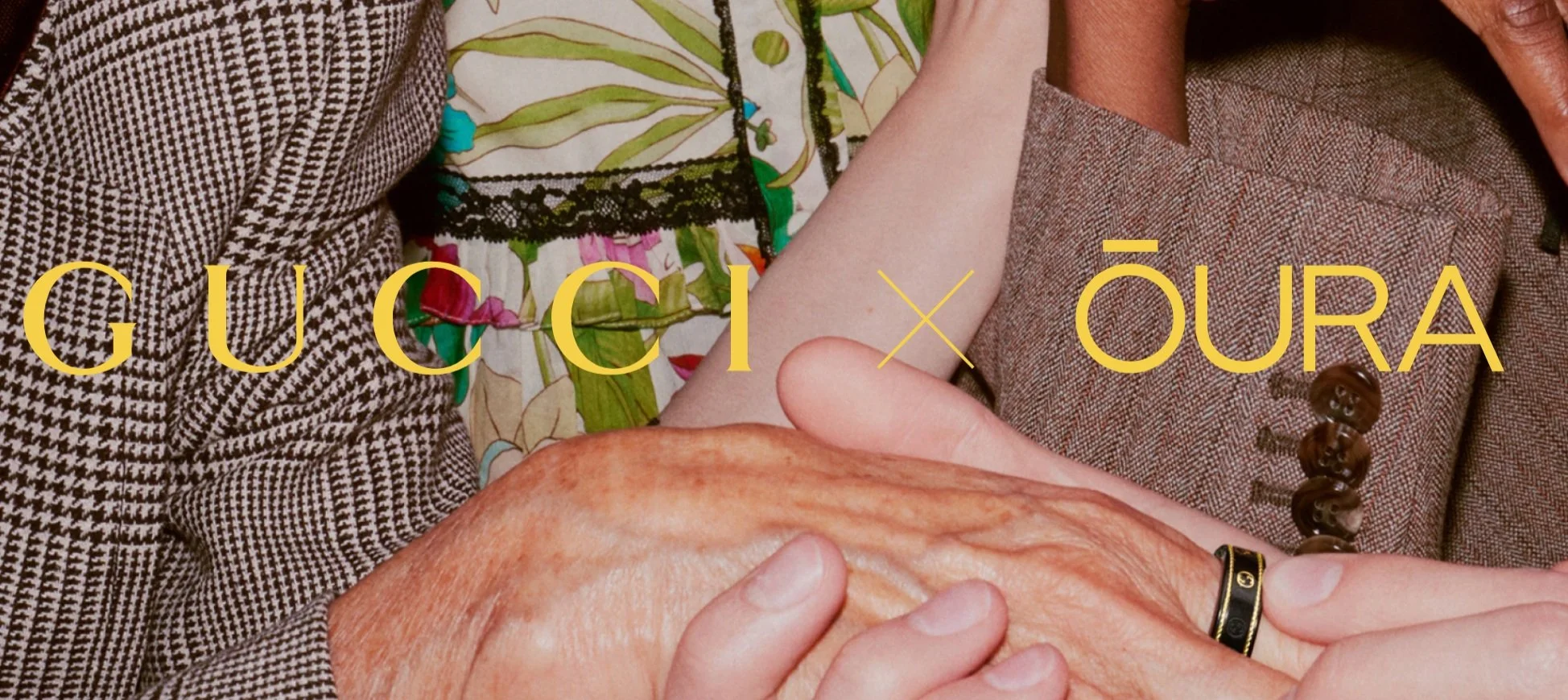 Guccii x Oura campaign image featuring hands and the collaboration ring.
