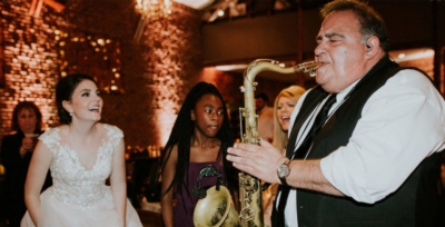 Dallas-Wedding-Band-Sax-with-Bride-400x275_c.jpg
