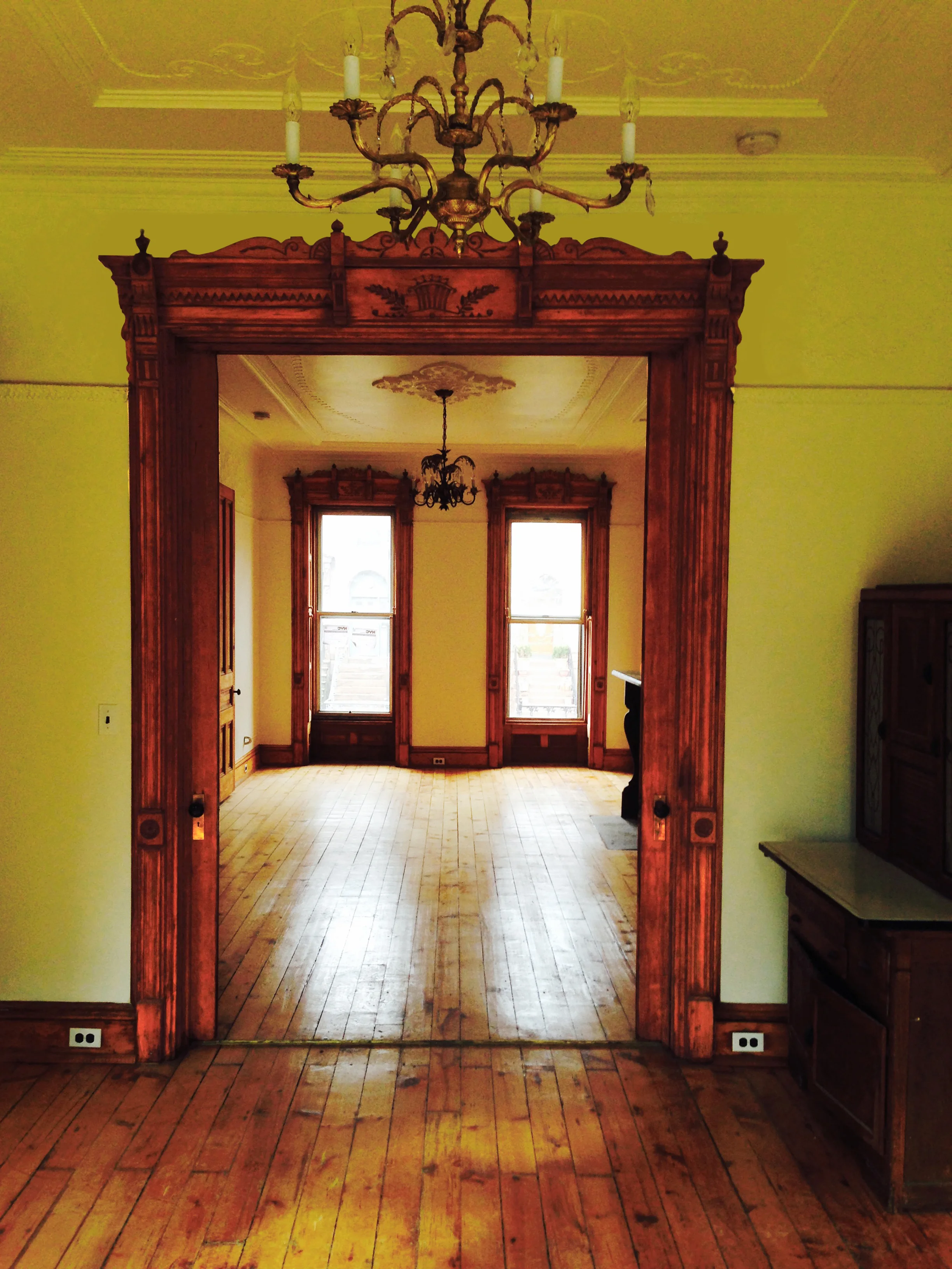 Continuation of restoration, including restoration of original lighting.