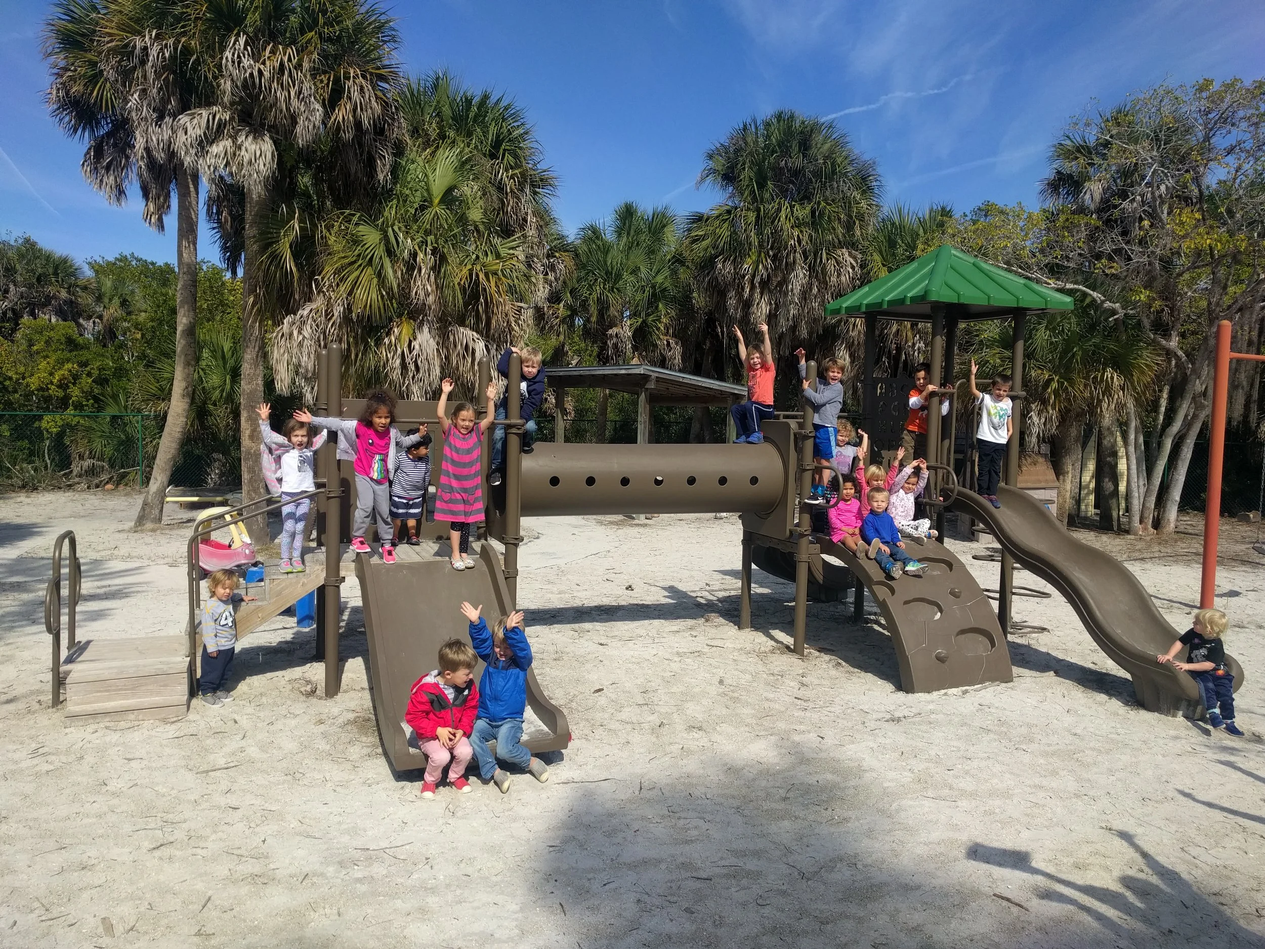 Students celebrating their “new” play structure!