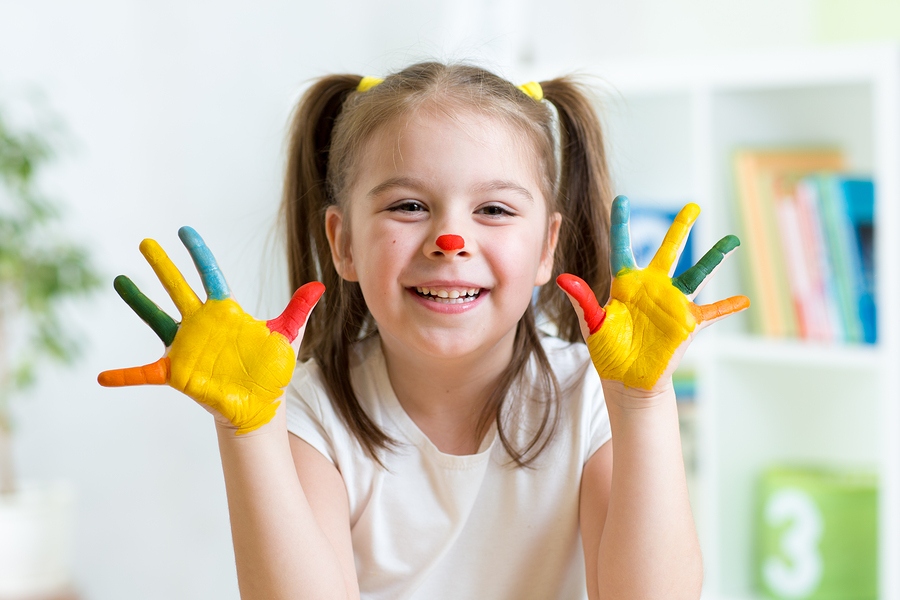 bigstock-cute-cheerful-child-with-paint-83812328.jpg