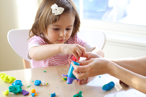 little-girl-playing-with-clay.jpg