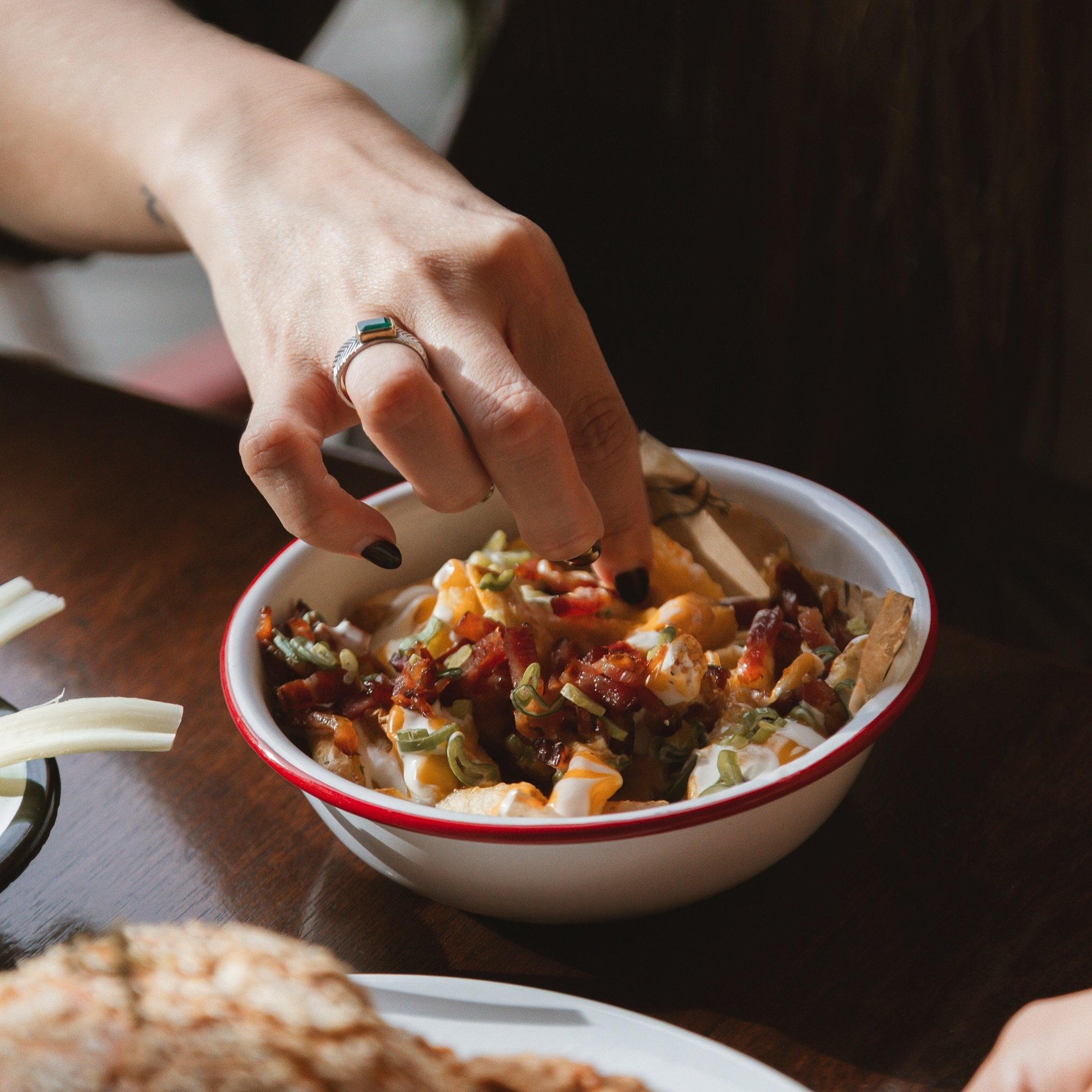 **Dive into Flavor! 🍔✨**

Our loaded fries are the perfect sidekick to your favorite Birdie&rsquo;s burger. Topped with a mouthwatering mix of cheese, bacon, and green onions, these fries are a crowd favorite. Don&rsquo;t miss out&mdash;grab your se
