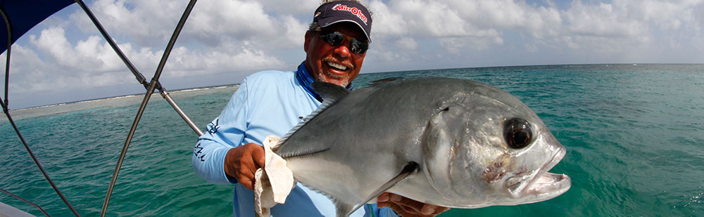 Spin fishing on the saltwater flats in Belize.
