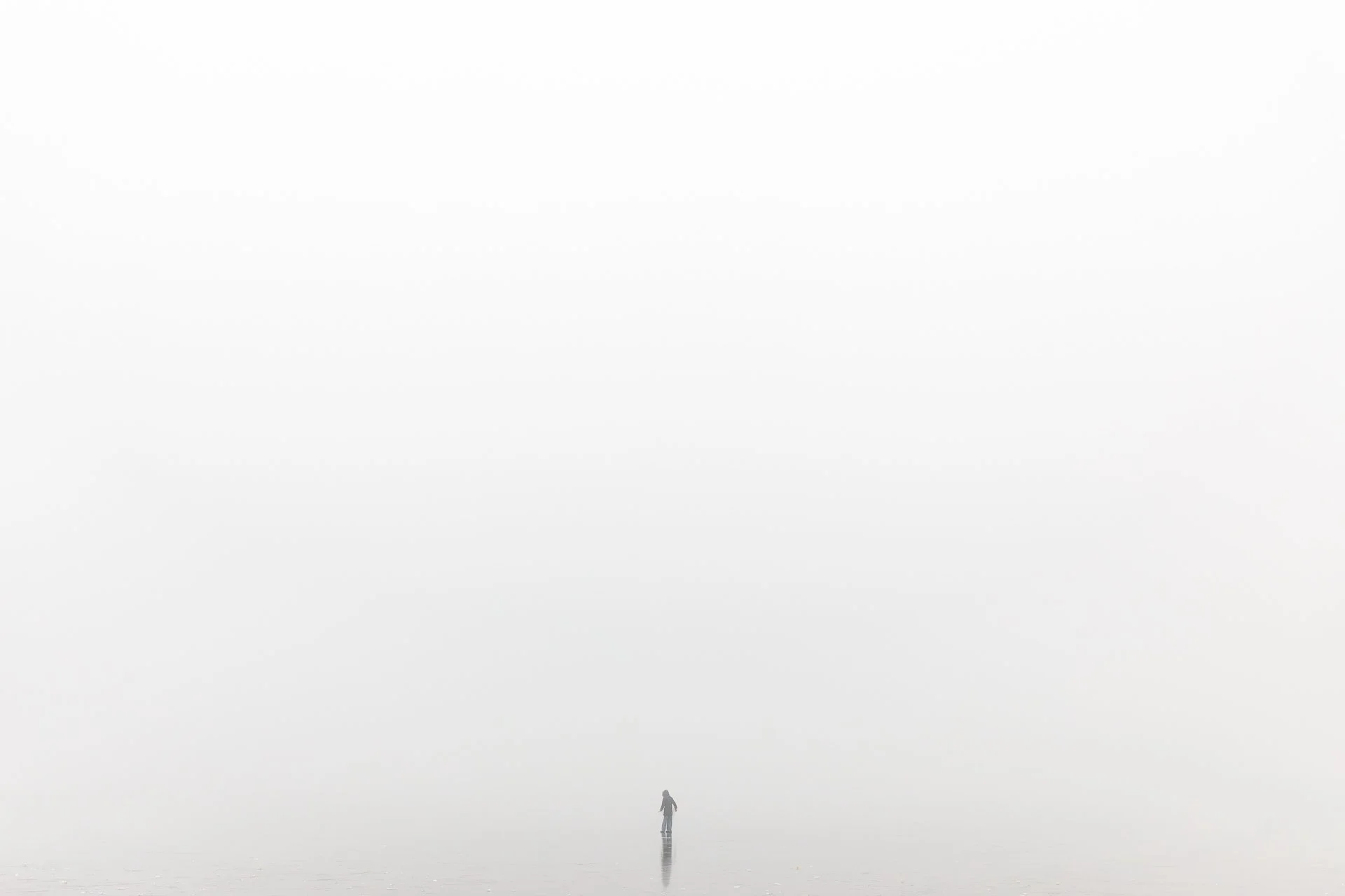 child-exploring-frozen-lake-port-meadow-oxford-england.jpg