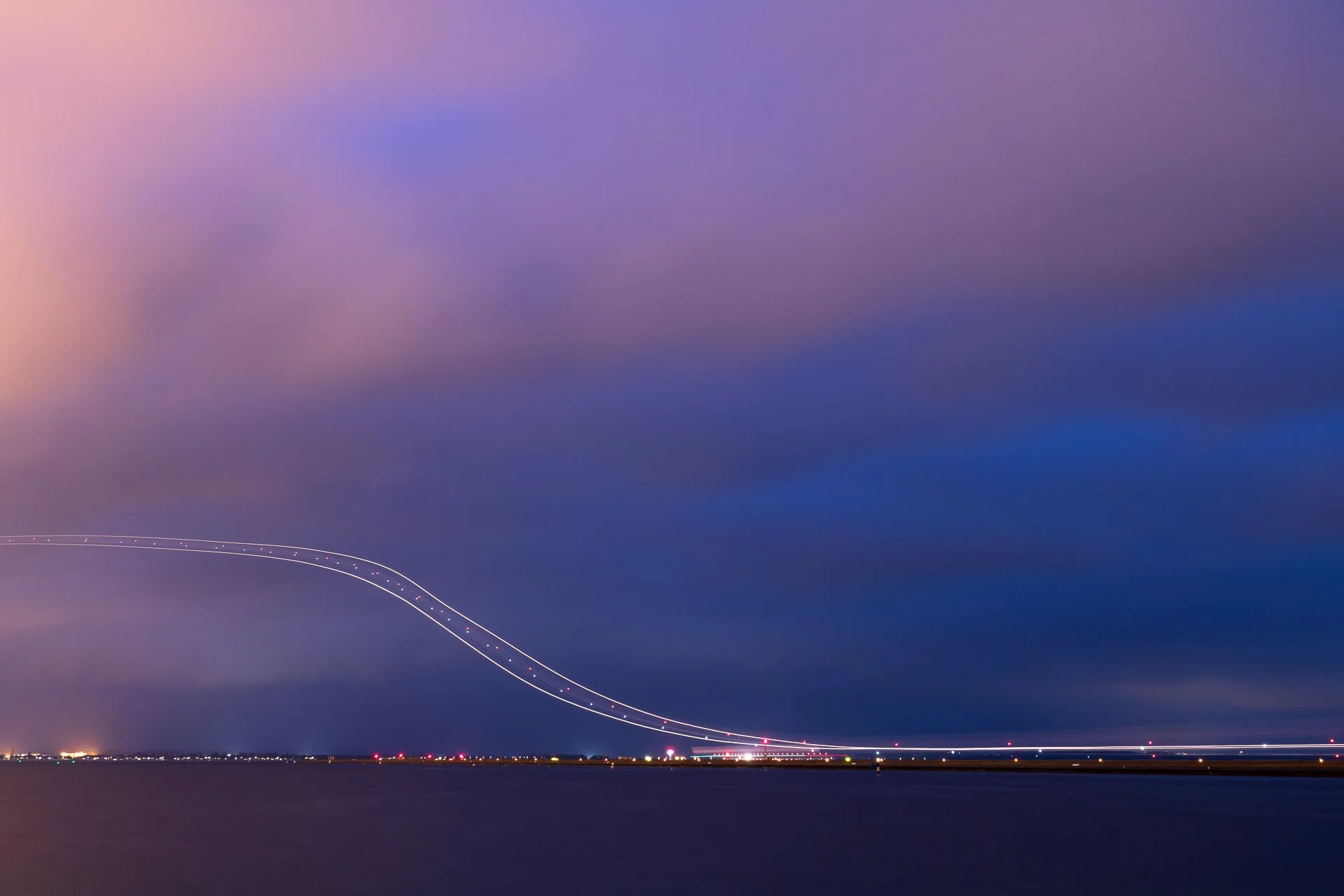 aircraft-light-trail-botany-bay-sydney-airport-australia.jpg