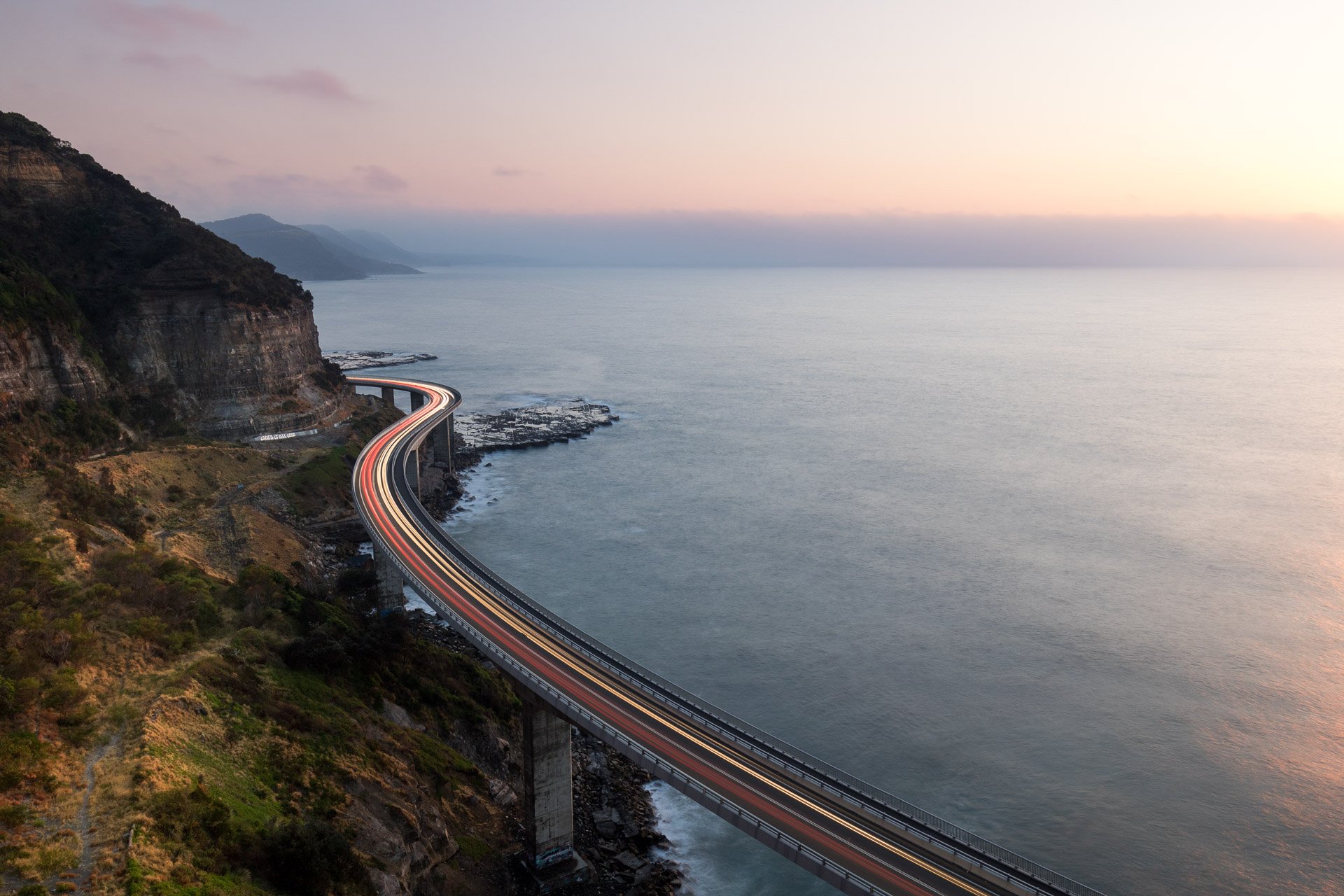 Sea-cliff-bridge-sunrise-light-trails-new-south-wales-australia.jpg