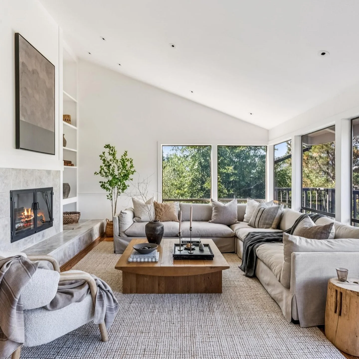 Perfectly located in the flats and at the end of a private driveway, this home feels like an escape where every day begins and ends with panoramic views of Mt. Tam. Vaulted ceilings, expansive windows, and two fireplaces create a warm, light-filled b