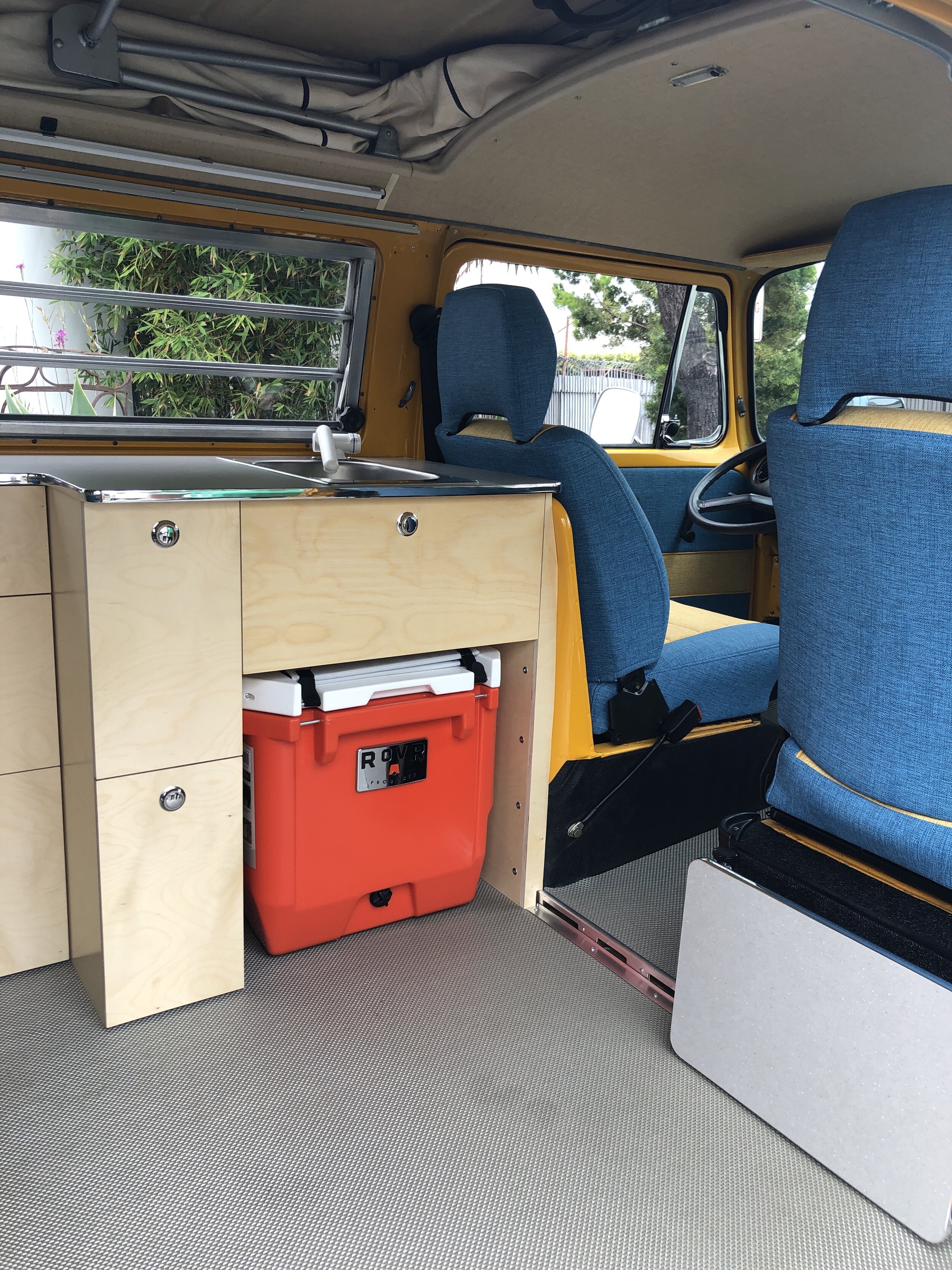  Custom cabinetry building involved restoration of some original Westphalia camper cabinets and design/build of new ones that incorporated the clients wish list.  