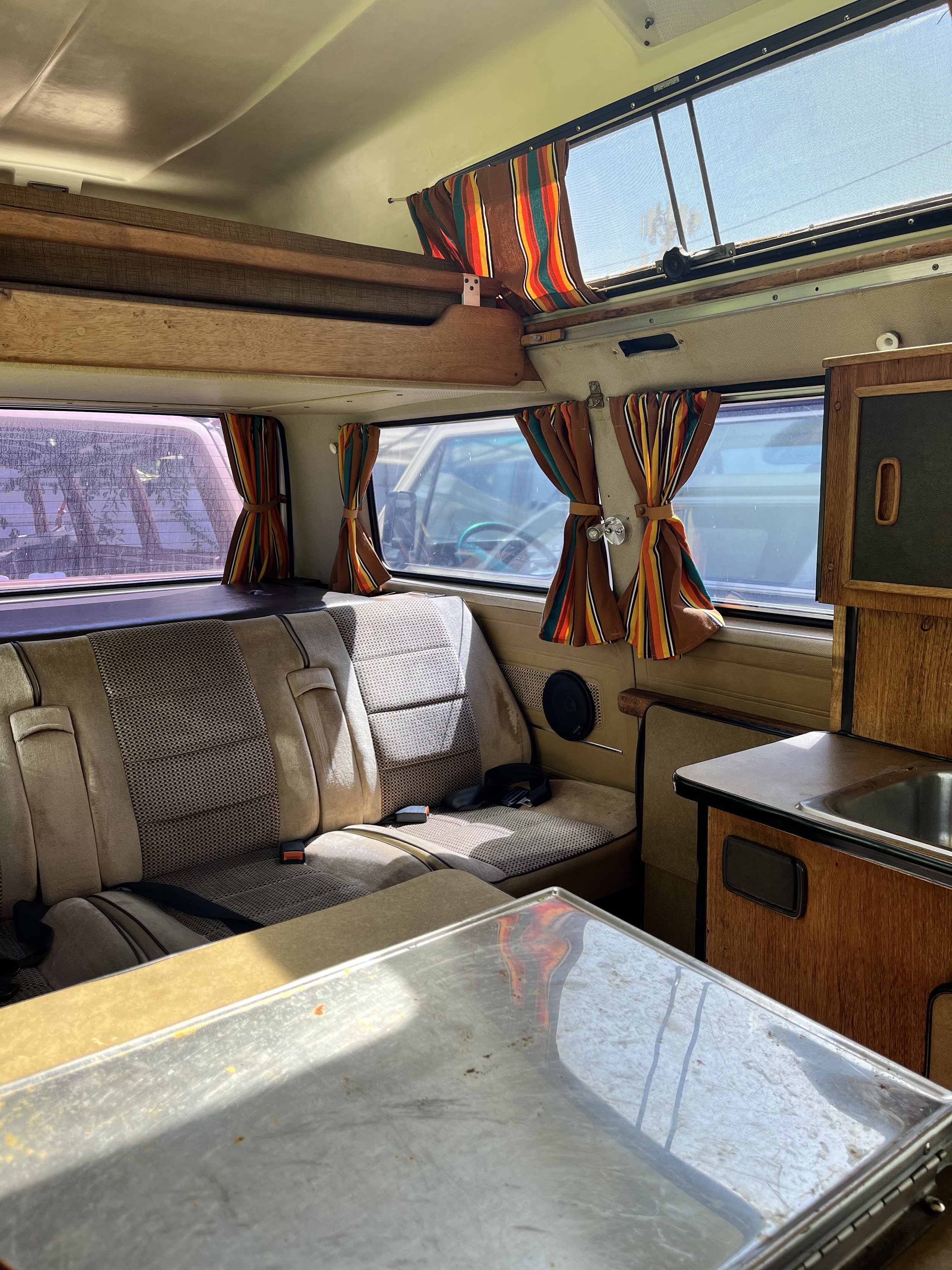 Easily stand without having to stoop or deploy a tent type pop-top, new window coverings