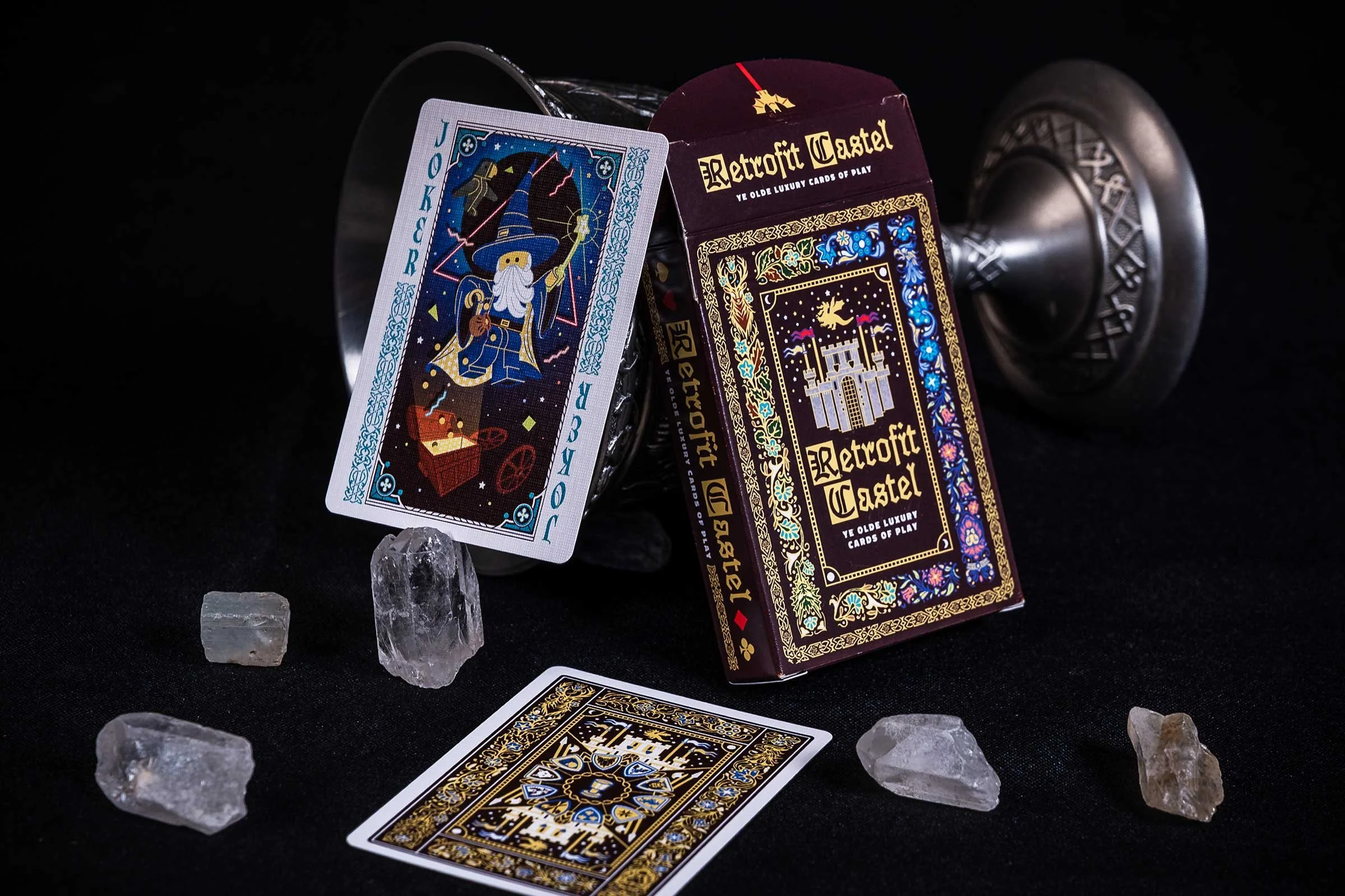 Goblet tipped over poker card joker with two joker, tuck box, and card back
