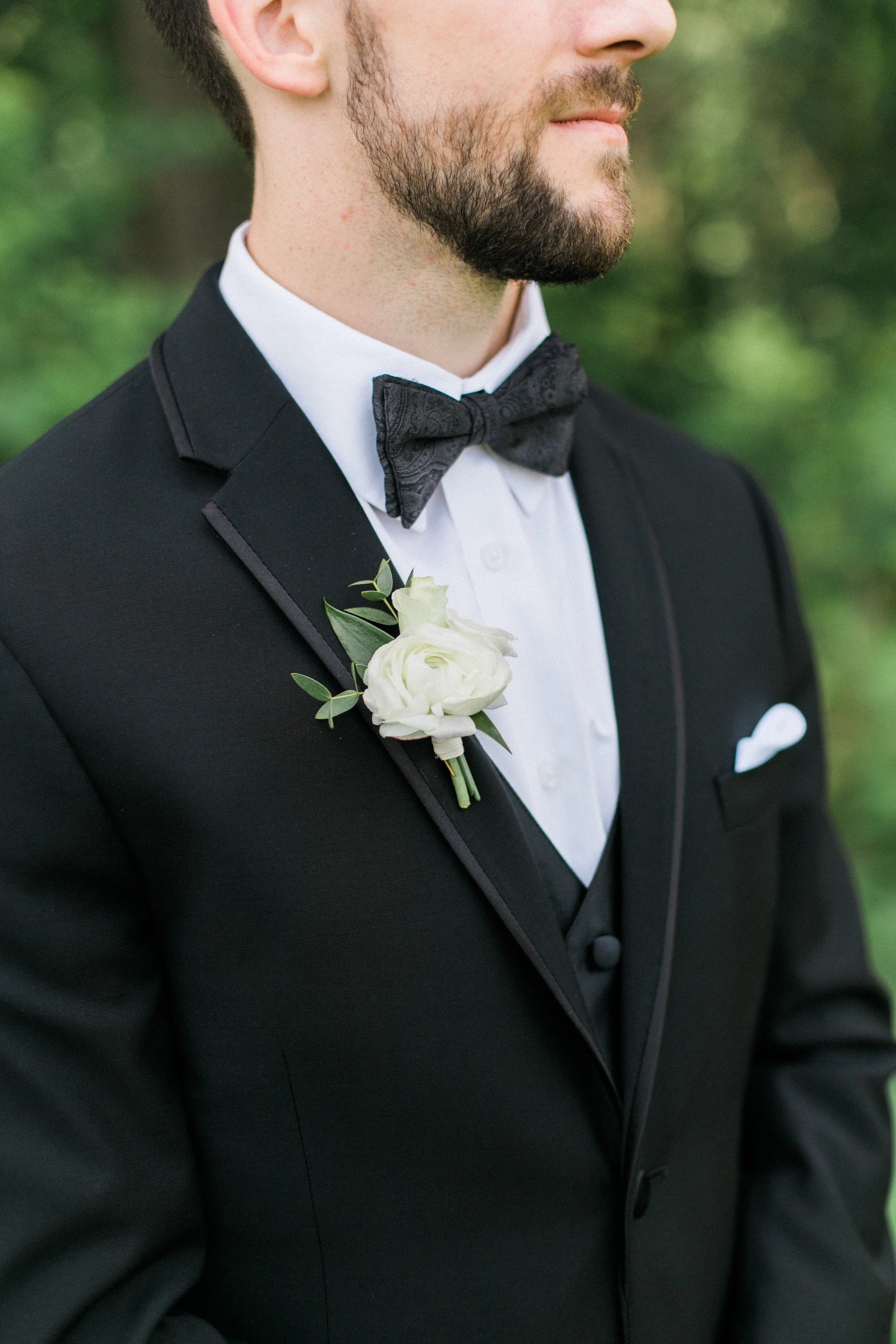 White ranunculus boutonniere at the capital, Madison Wisconsin; Flowers by Garden Laurels, Verona Wisconsin