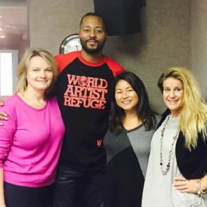 Doris with Morris Peterson Jr. and SuperTalk 157o Co-hosts Candice Montie (left) and Kristen Wolosonowich (right). 