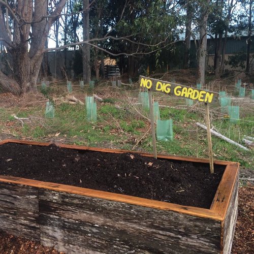The finished No-dig garden, complete with a groovy sign post! This final layer can be planted into in at least 3 weeks time. It's best that we let the garden bed sit for a while, especially to give the horse manure some time to settle in. It will be creating a lot of heat as it breaks down, and that could be too much for some young plants to handle! Many thanks to Ali for running the workshop, Adrian for building the frame from some recycled fence posts, and to all of our enthusiastic participants and helpers. Fabulous effort!!