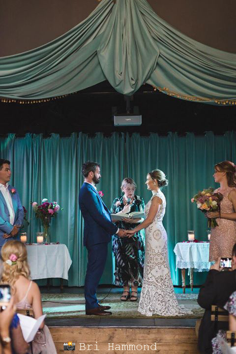 C&P wedding - ceremony on stage.jpg