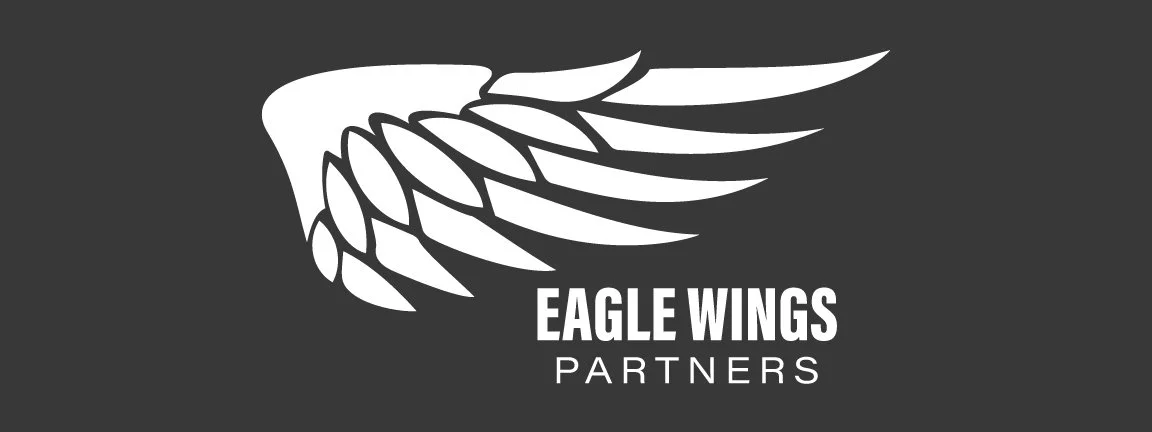 EaglesWingsPartners_WebHeader_Inverted_Charcoal.jpg