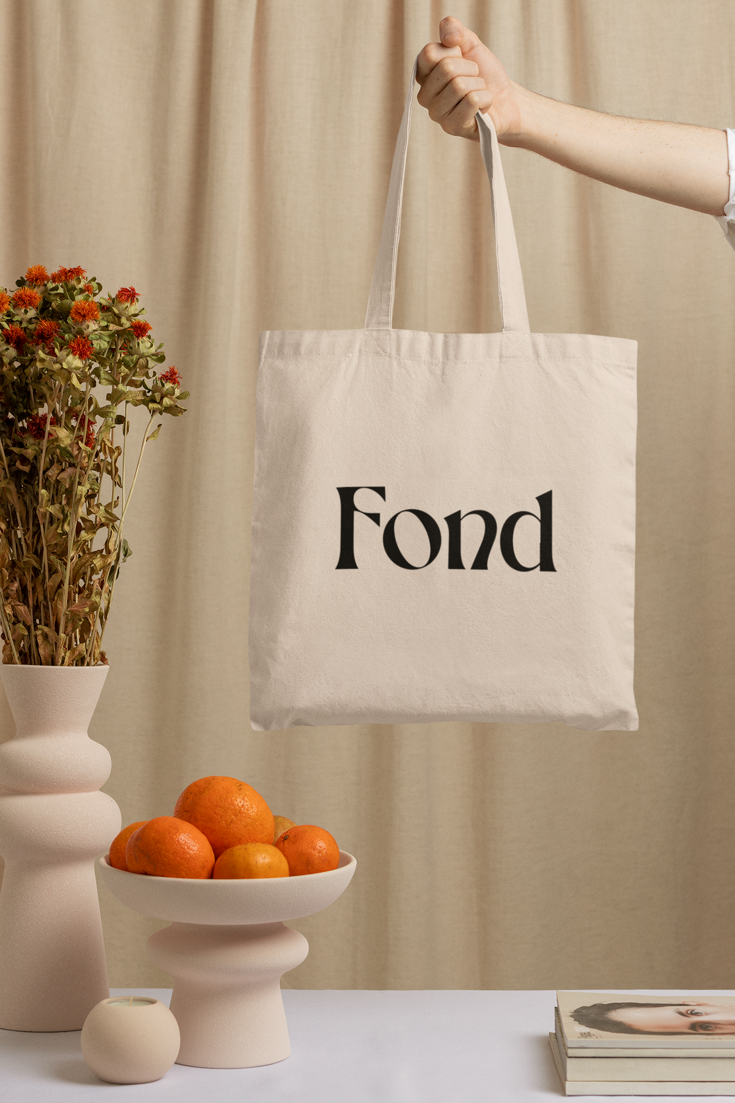 mockup-of-a-woman-holding-a-tote-bag-in-a-minimal-setting-m23510.png