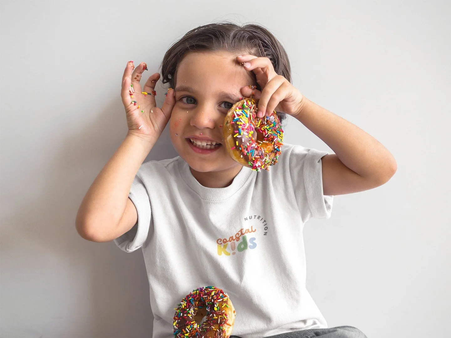 When your client&rsquo;s all about kids&rsquo; nutrition&hellip; but the model had other plans. 🍩😏 Branding for Coastal Kids Nutrition &mdash; because balance (and a little mischief) is key. #coastalkidsnutrition #mocreativebranding #bemocreative
