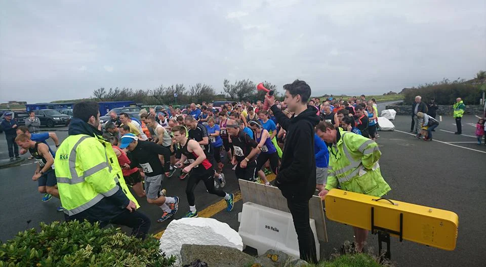 R.G. Falla Quarter Marathon. Jonah seeing the runners off at the start. £1,500.00 was raised.