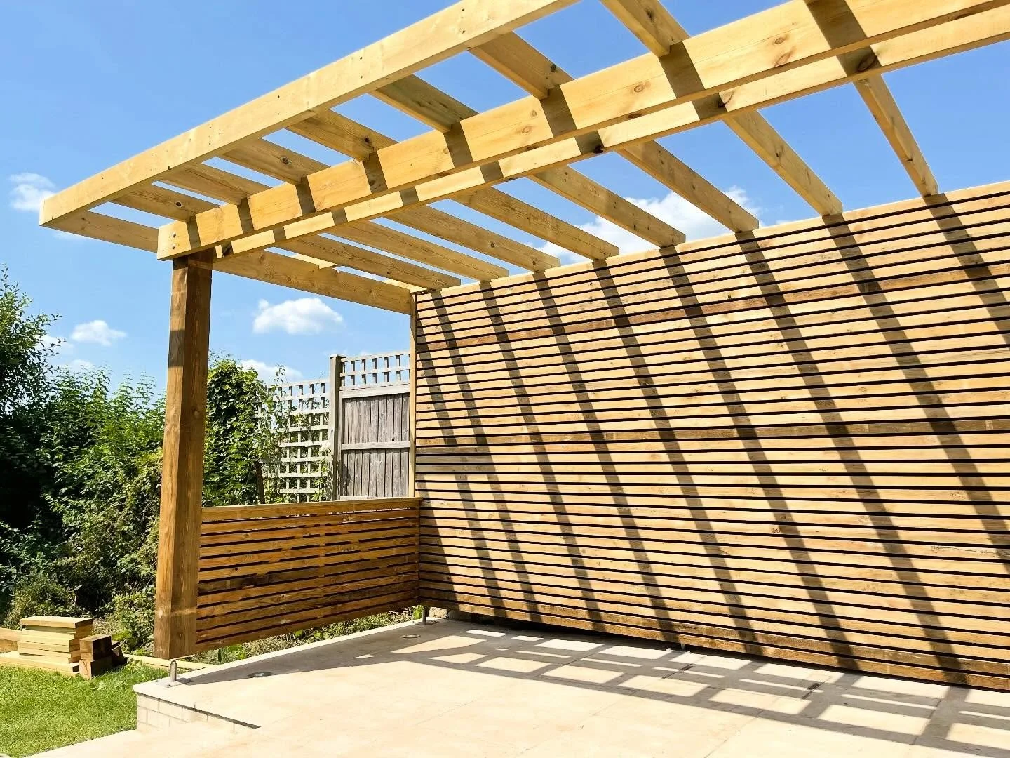 &bull; P E R G O L A &bull;
Some pics of sunnier times to raise the spirits! Here is a pergola Oli and Jesse built for some clients in Widcombe, Bath. The treated pine timber will have weathered to a pretty grey colour now. We placed the posts on gal