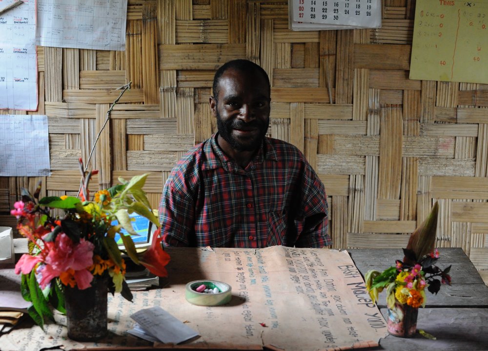  The elementary school teacher at his desk. Gua, 2009. 