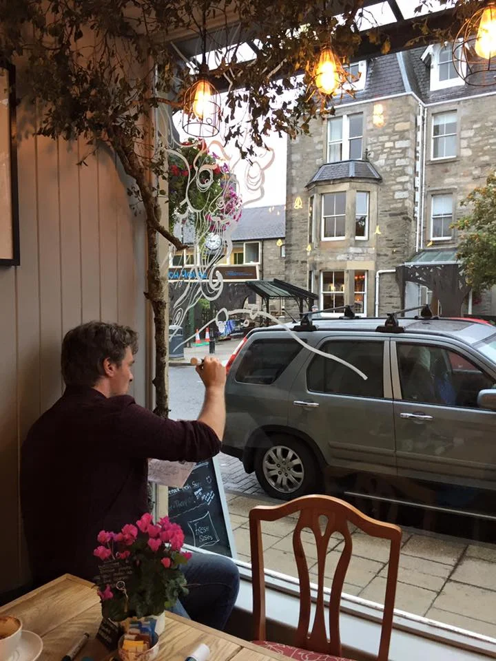 Getting started on Café Calluna’s windows for The Enchanted Forest.