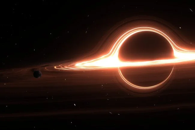 shutterstock_black-hole-space-650x434.jpg