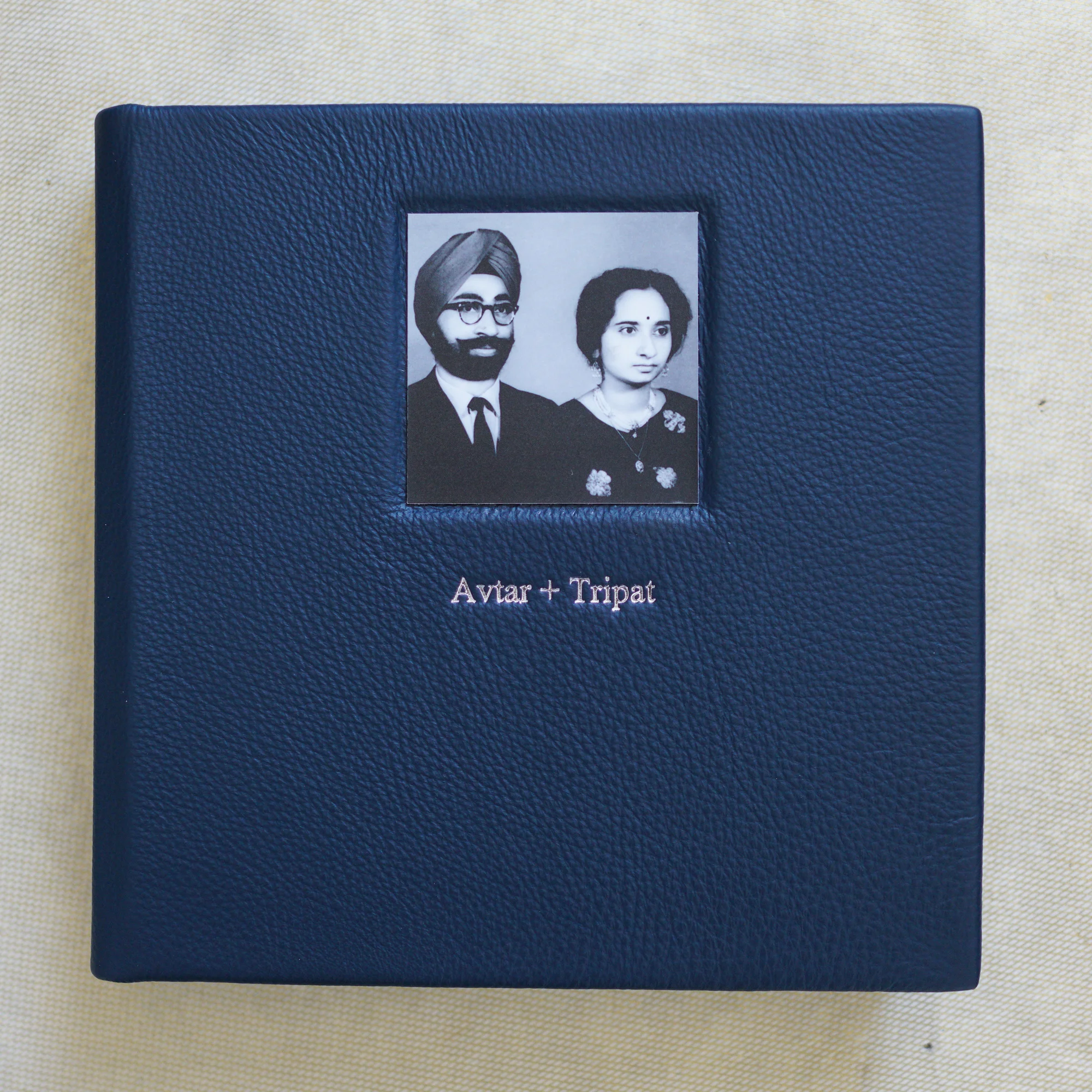 Avtar and Tripat decided to throw a surprise party for their father’s 80th birthday. As a memento they created this 9x9 memory book and used one of the first images ever taken of their parents as a way to display their love.