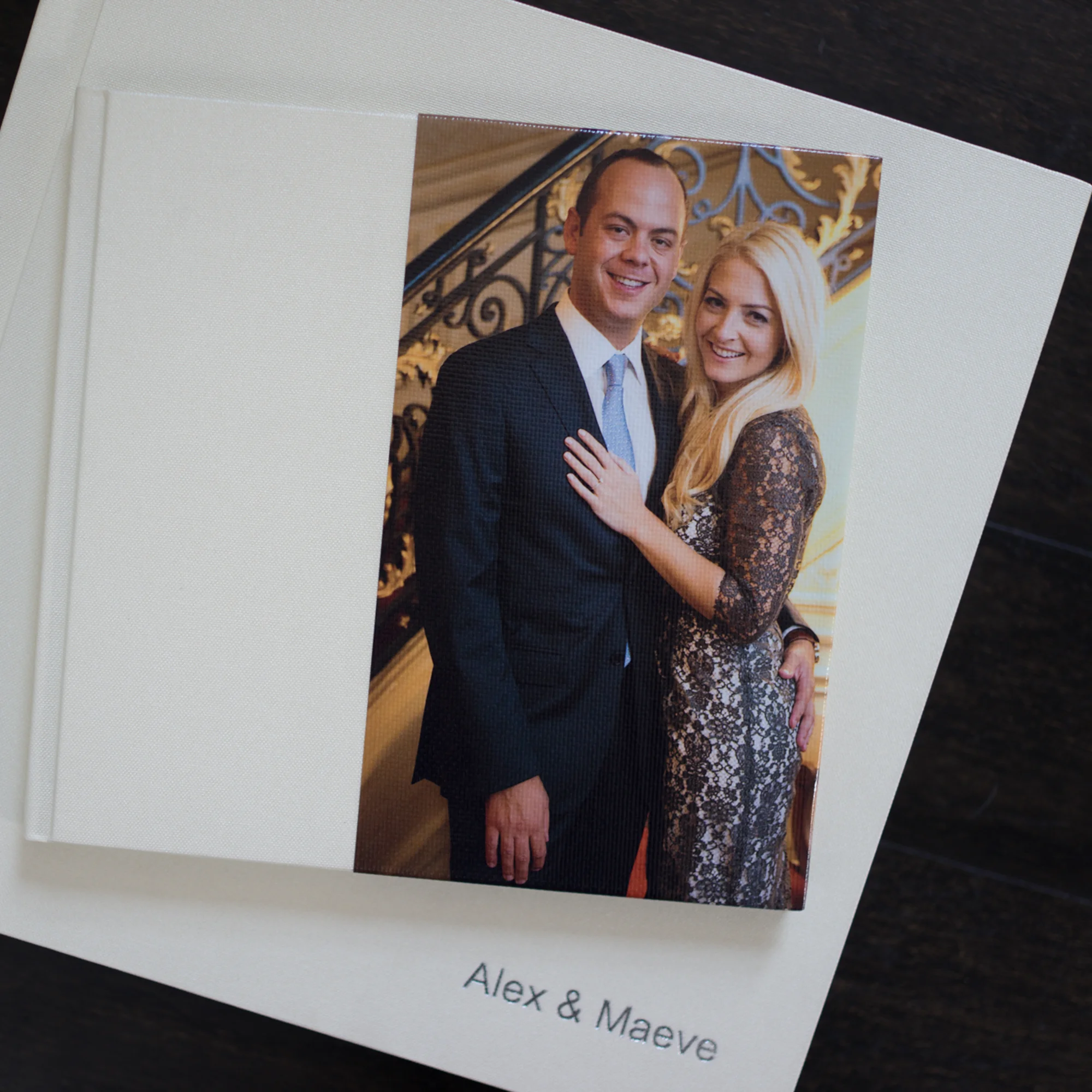 Alex and Maeve’s engagement and wedding albums needed to stand out, but still feel like they belonged together, so they opted for matching Buckram Pearl covers and a eye-catching canvas wrap for their Coffee Table Books.