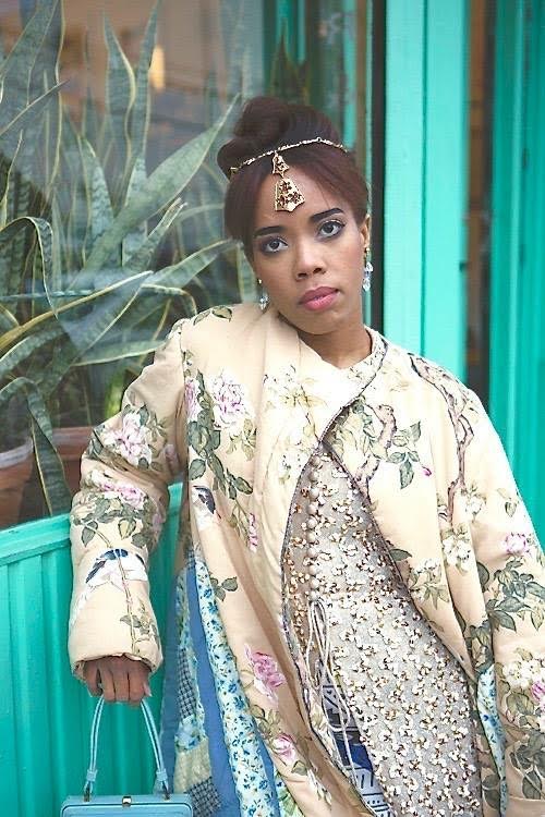 Floral “comforter coat” designed by Pratt Fashion graduate Lauren Nahigian (BFA ’15); late 60s/early 70s Lee Jordan gold sequin robe, Ahab Bowen, Dallas, TX; 80s “highlighter” tribal print body con dress from vendor at Artists and Fleas, Williamsburg, Brooklyn; powder blue leather handbag from 1 of a Find Vintage, Brooklyn; heirloom crystal earrings; vintage brutalist gold necklace (worn as a headpiece) from 1 of a Find Vintage, Brooklyn; Photo Credit: Guang Xu