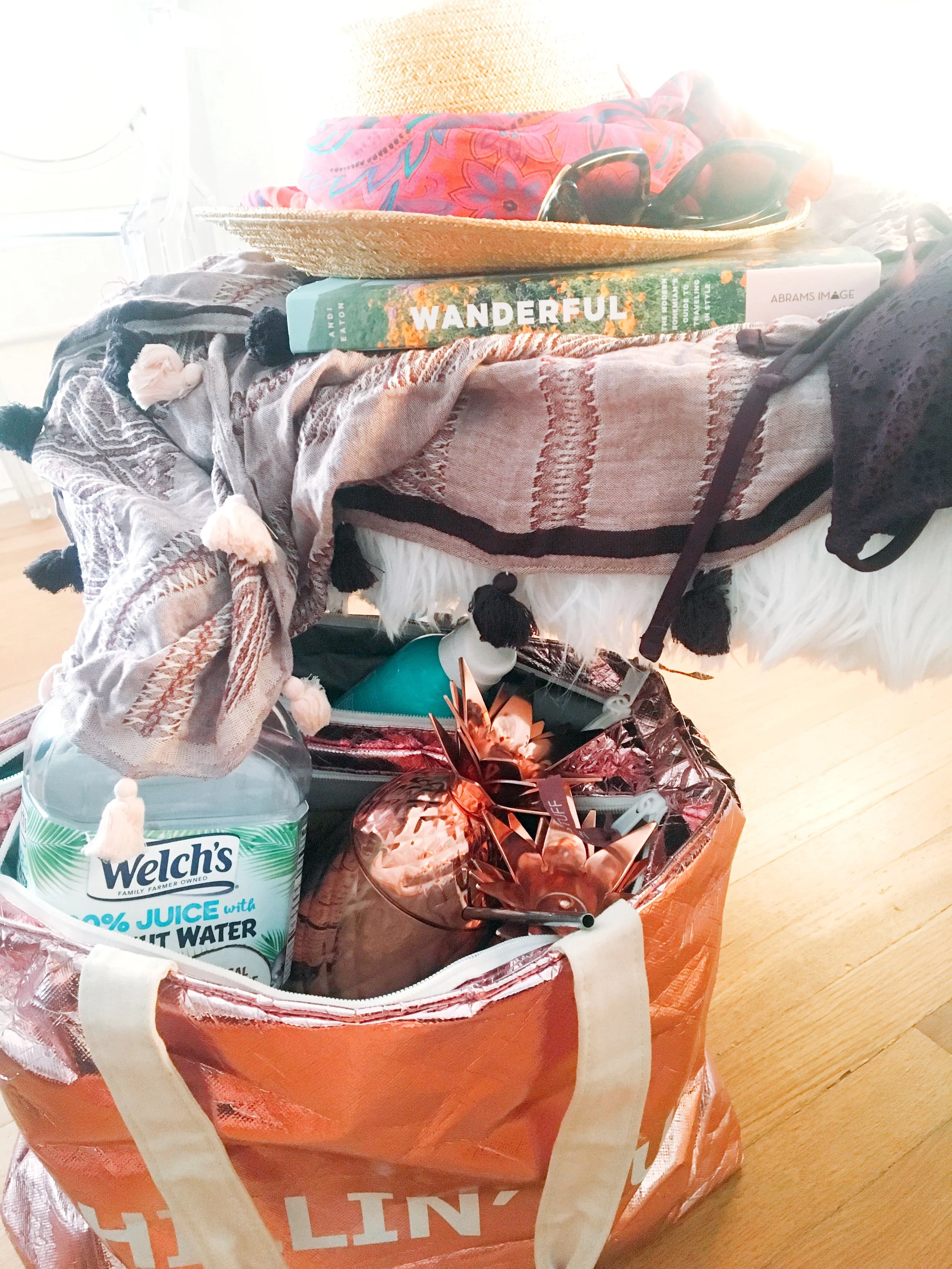 Pool Day Essentials Including Your New Fave Refreshing Drink