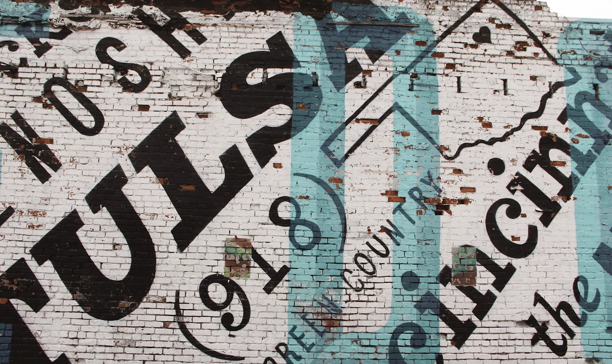 Find this mural by Hurts Donuts…