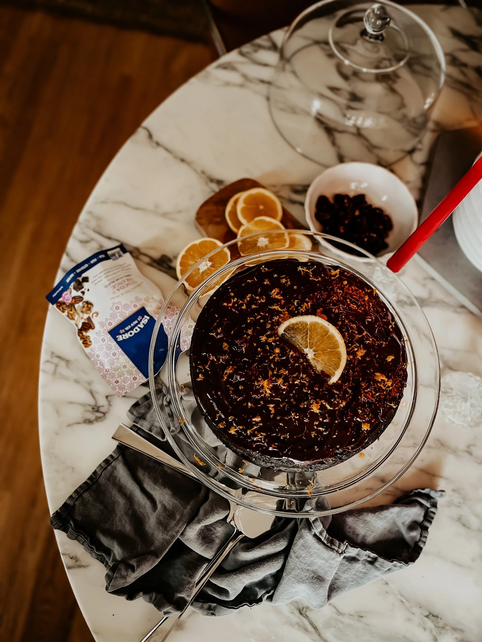 Chocolate Orange Cake With Chocolate + Orange Buttercream Frosting with cocoa Orange nuts