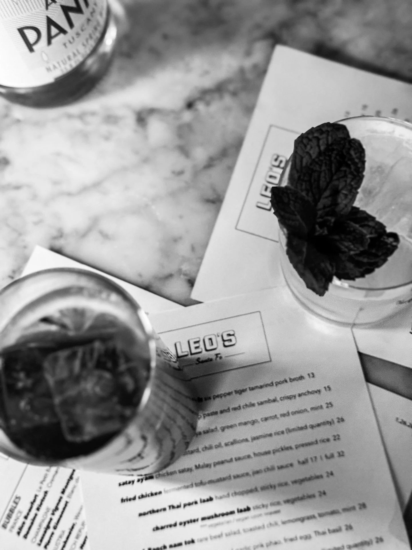 Finally slipped into @leossantafe last night with @merso.monsoon and for a few hours, Santa Fe felt like somewhere else entirely.

Blistered &amp; braised collards.
Six pepper tiger tamarind pork broth &mdash; layered, warming, complex in that quiet 