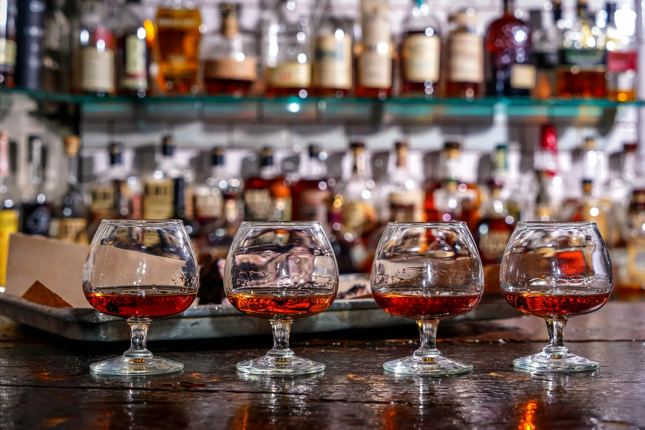 A flight of Whiskeys, four glasses