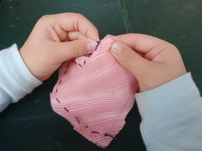 hand sewing kid.jpg