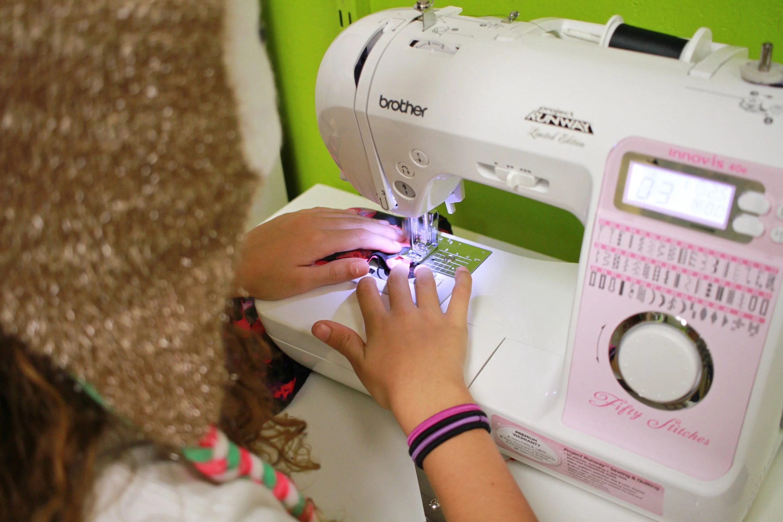 girl sewing.jpg