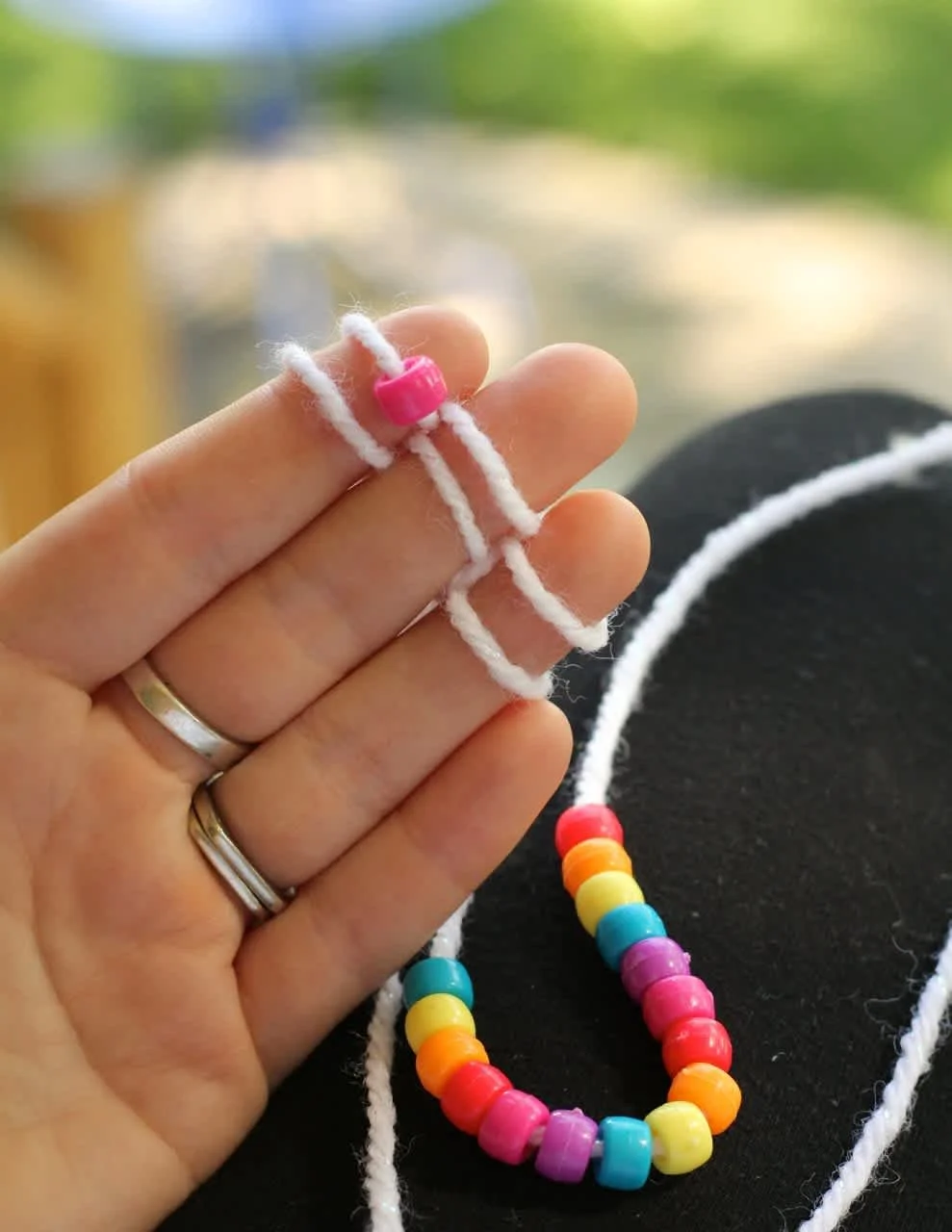 Strung-Beads-with-One-Slipped-On-Finger-Knitting-Craft-Project.jpg