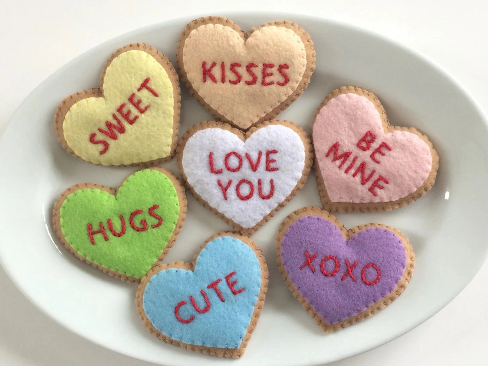 hand sewn heart valentine cookies.jpeg