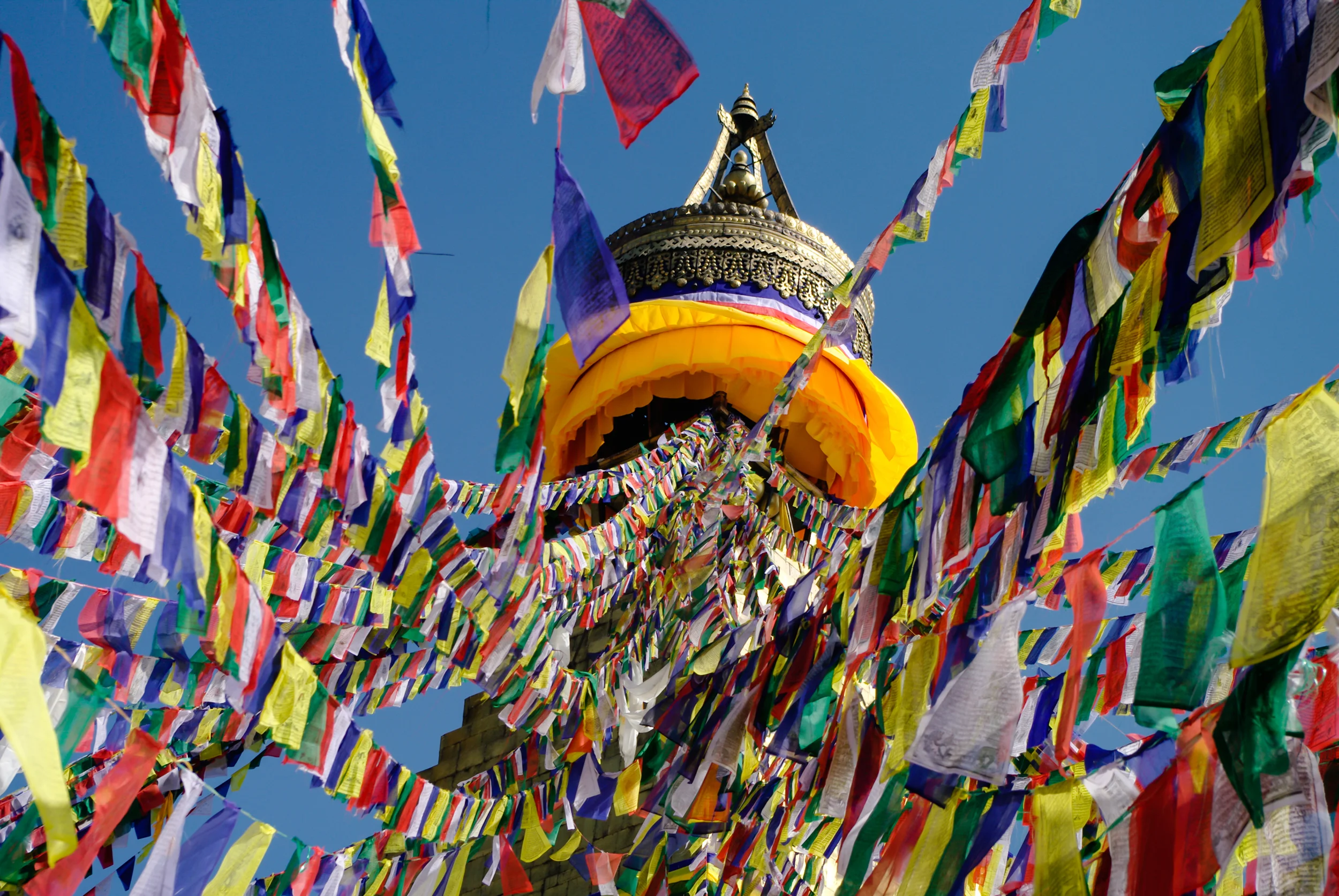 bigstock-Colored-Flags-Hanging-From-The-112568987.jpg
