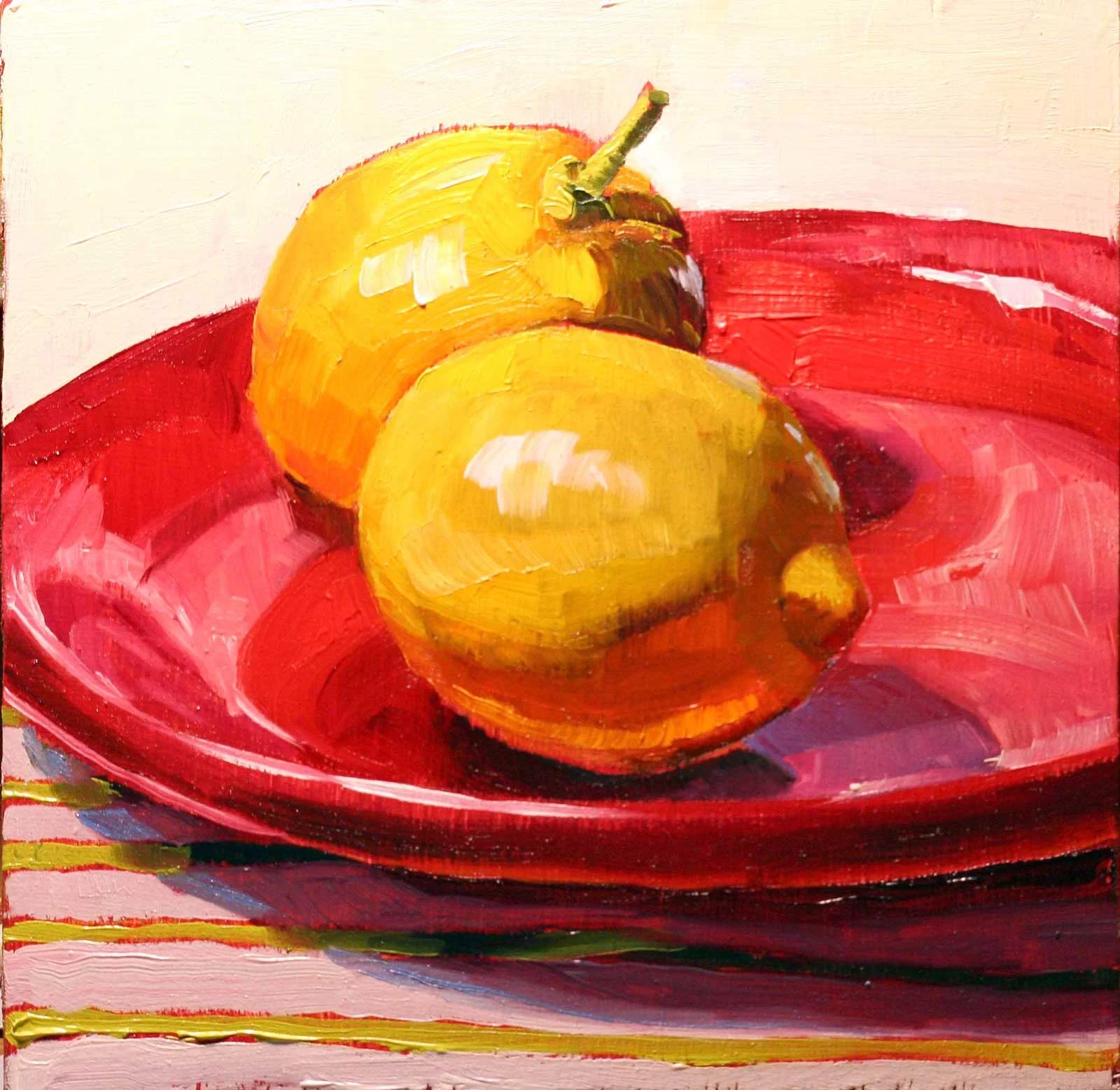 Lemons on a Red Plate