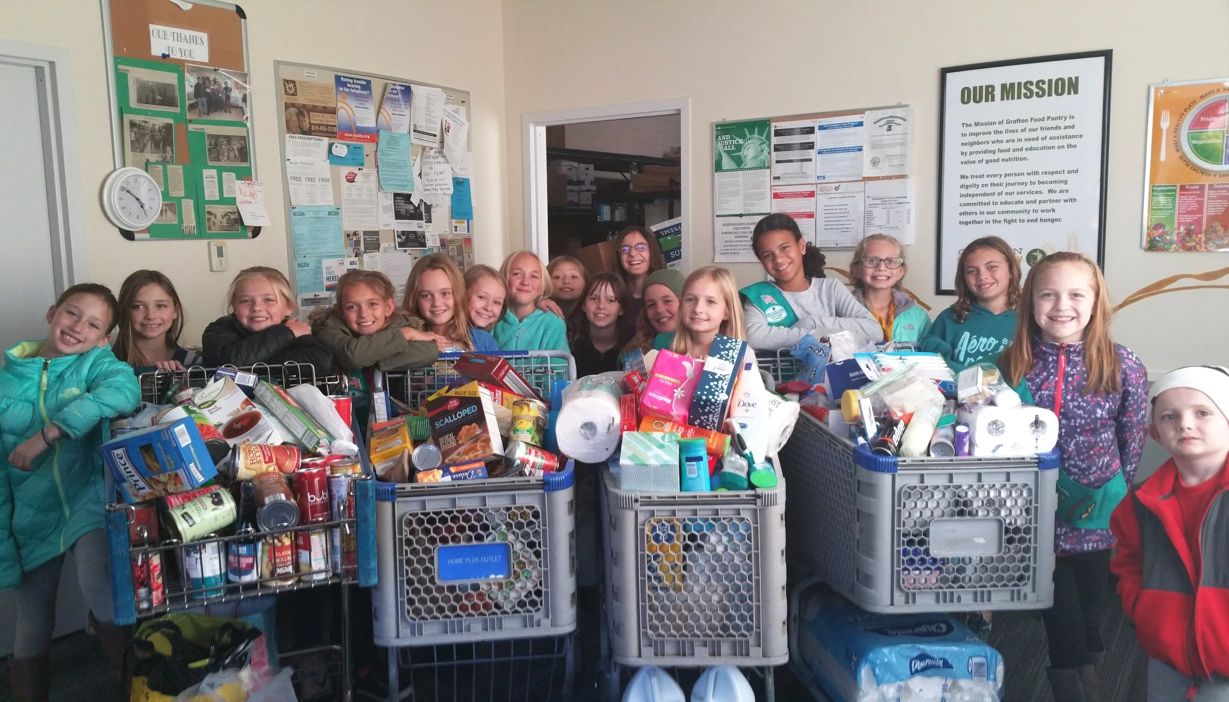 Huntley Junior Girl Scout Troop 1009 held a bountiful food drive and toured the Pantry.