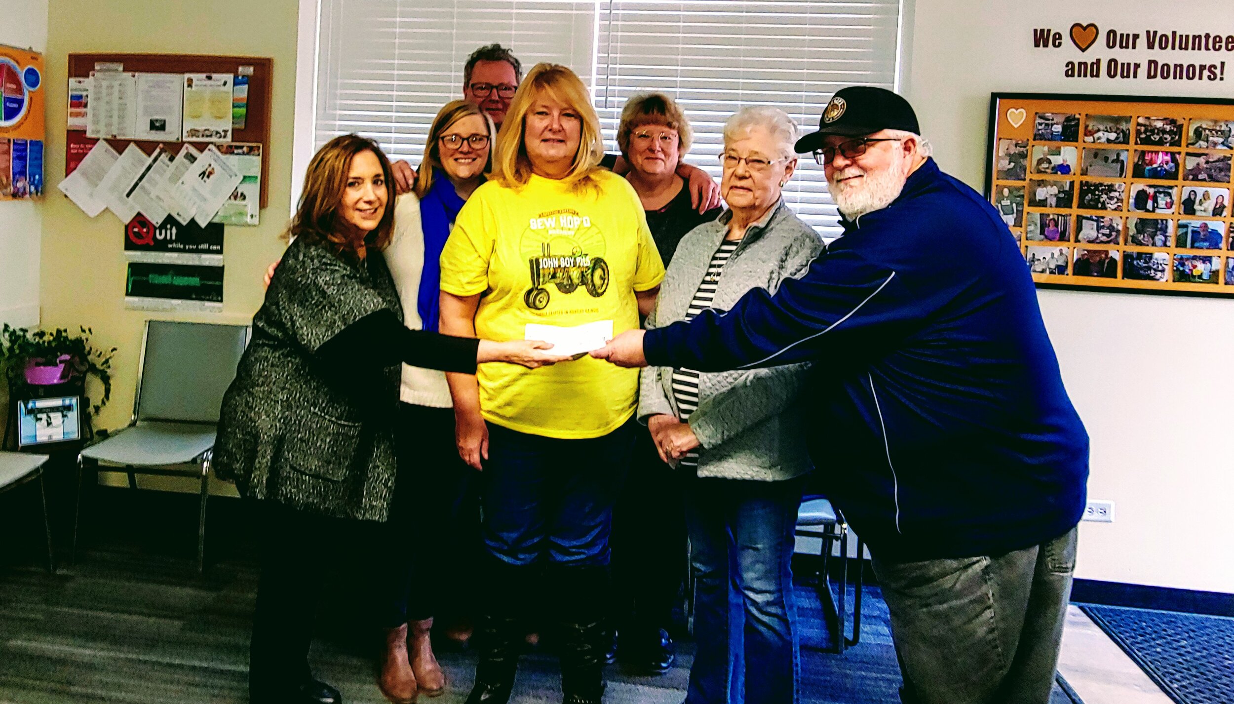  The Hoffman Family and Lance Lamb of Sew Hop'd in Huntley present donations of over $1200 from the launch of John Boy Beer in memory of local resident John Hoffman.  A portion of the proceeds from sales of the beer and the t-shirts will be donated t