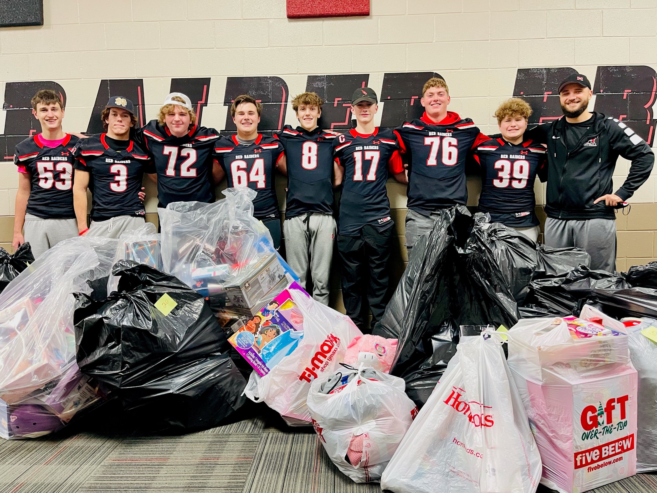 The Huntley High School football program collected 383 toys and gifts and presented them to the Grafton Food Pantry to distribute this holiday season.