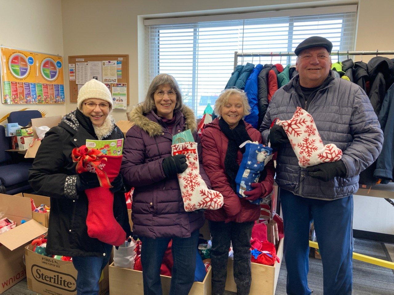 Big holiday thank you to Sun City Huntley Sunflower Garden Club  for their donation if hundreds of holiday stockings overflowing with goodies.